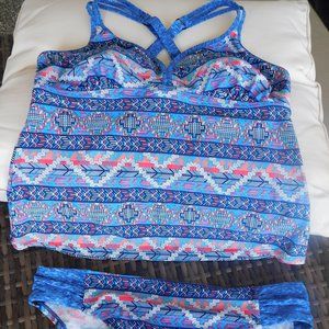 Beautiful swimsuit.Light blue and turquoise very cheerful.With very fine details
